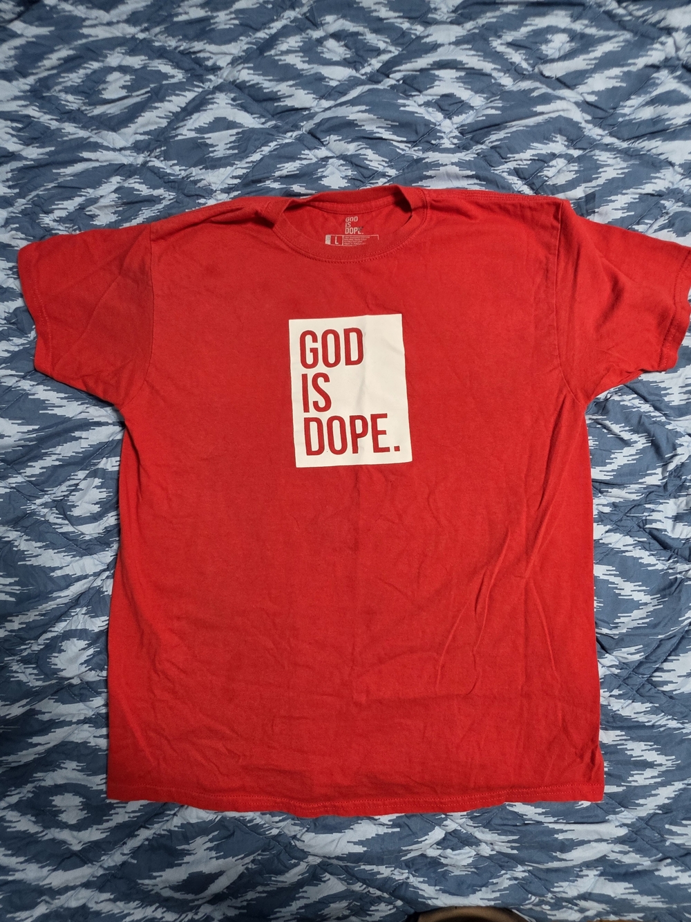 Red Graphic Tee with White 'God Is Dope' Print Size Large.